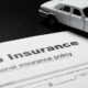 auto insurance paperwork toy car 573x300