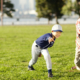 Kid throwing baseball